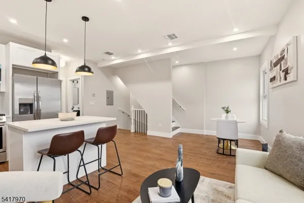 a dining room with furniture and a table