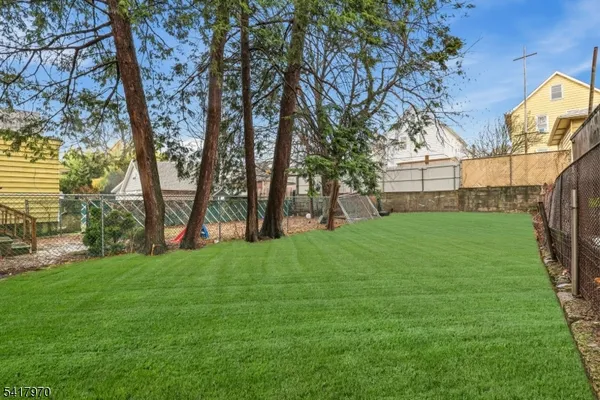 a view of a backyard with a garden