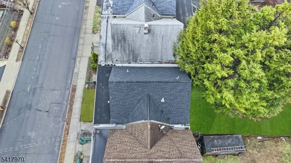 front view of a house with a garden