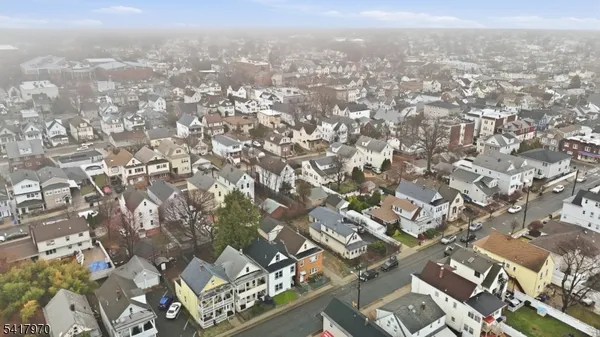 an aerial view of residential building with parking space