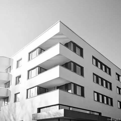 a view of building with large windows