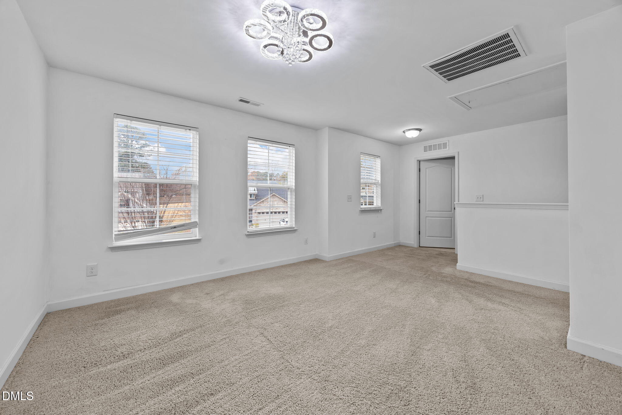 3409 South Beaver Lane Raleigh, NC 27604 - Photo 18 of 31 a view of an empty room with a window