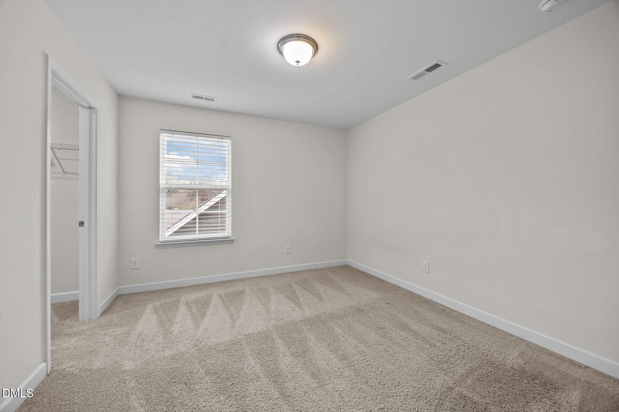 3409 South Beaver Lane Raleigh, NC 27604 - Photo 20 of 31 an empty room with windows