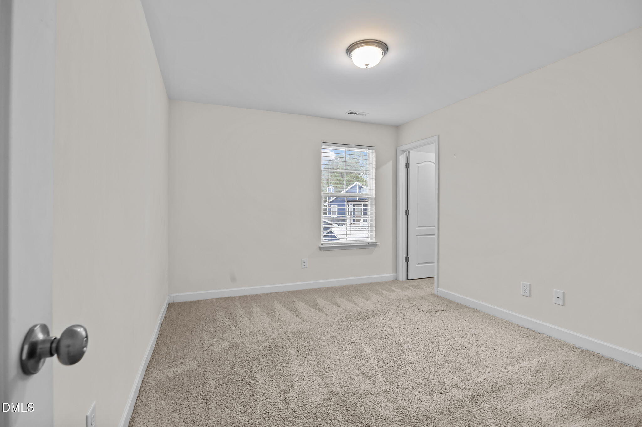 3409 South Beaver Lane Raleigh, NC 27604 - Photo 22 of 31 an empty room with windows