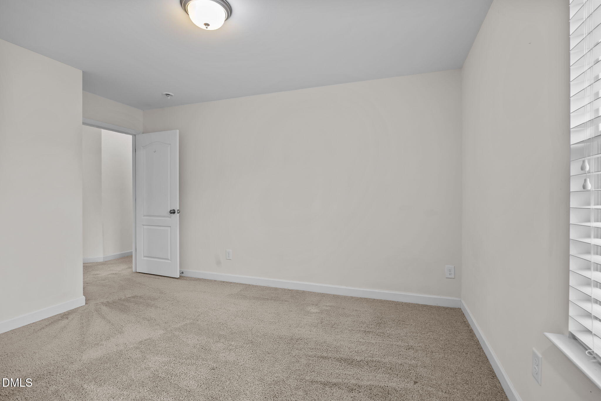 3409 South Beaver Lane Raleigh, NC 27604 - Photo 23 of 31 a view of an empty room and a window