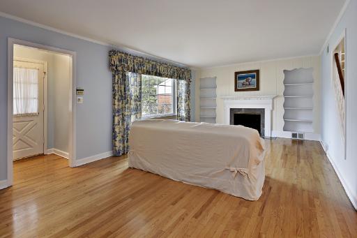 1010 Raleigh Road Glenview, IL 60025 - Photo 2 of 16 a bed sitting in a spacious bedroom next to a window