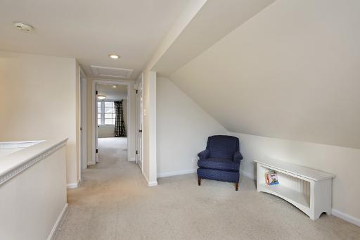 1010 Raleigh Road Glenview, IL 60025 - Photo 11 of 16 a living room with furniture and a hallway