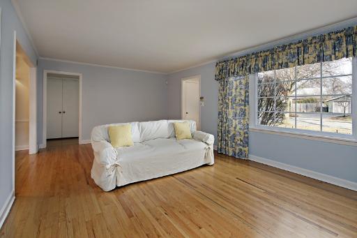 1010 Raleigh Road Glenview, IL 60025 - Photo 3 of 16 a living room with furniture and a large window