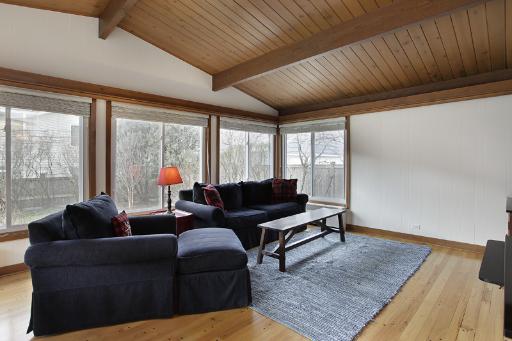 1010 Raleigh Road Glenview, IL 60025 - Photo 8 of 16 a living room with furniture and a large window