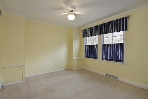 1010 Raleigh Road Glenview, IL 60025 - Photo 9 of 16 a view of an empty room with a fan
