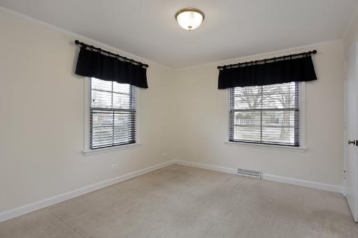 1010 Raleigh Road Glenview, IL 60025 - Photo 10 of 16 an empty room with a window