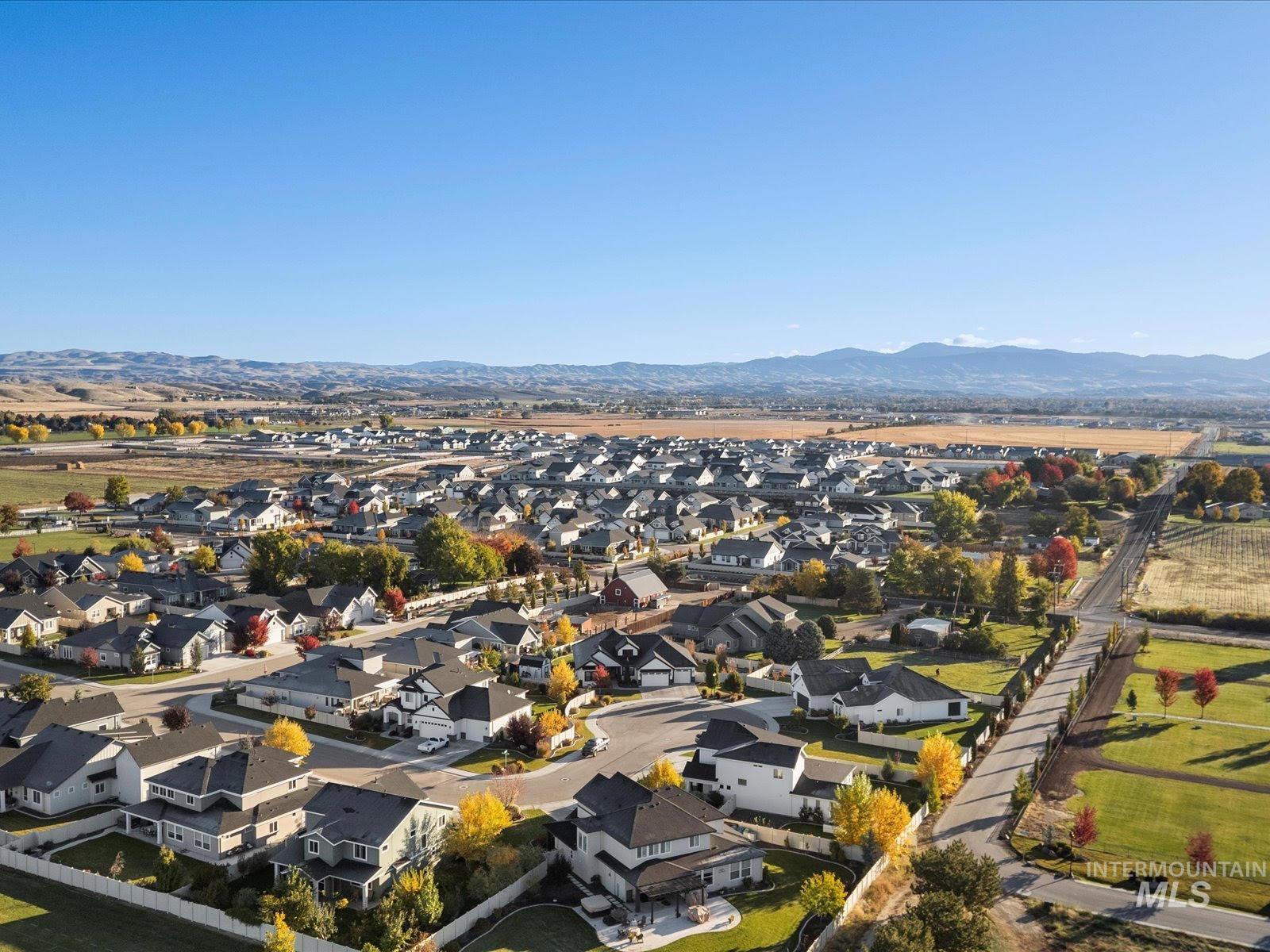 9573 West Stone Oak Lane Star, ID 83669 - Photo 10 of 24 Aerial view of residential area with mountains