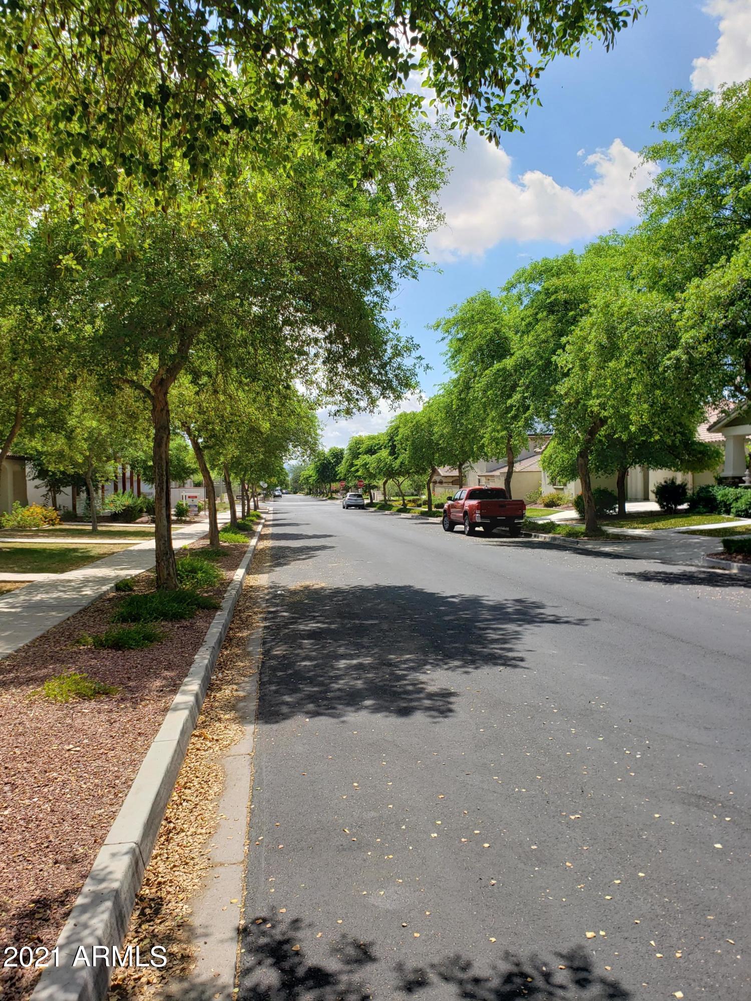 2549 North Riley Road Buckeye, AZ 85396 - Photo 2 of 46 a view of street with houses