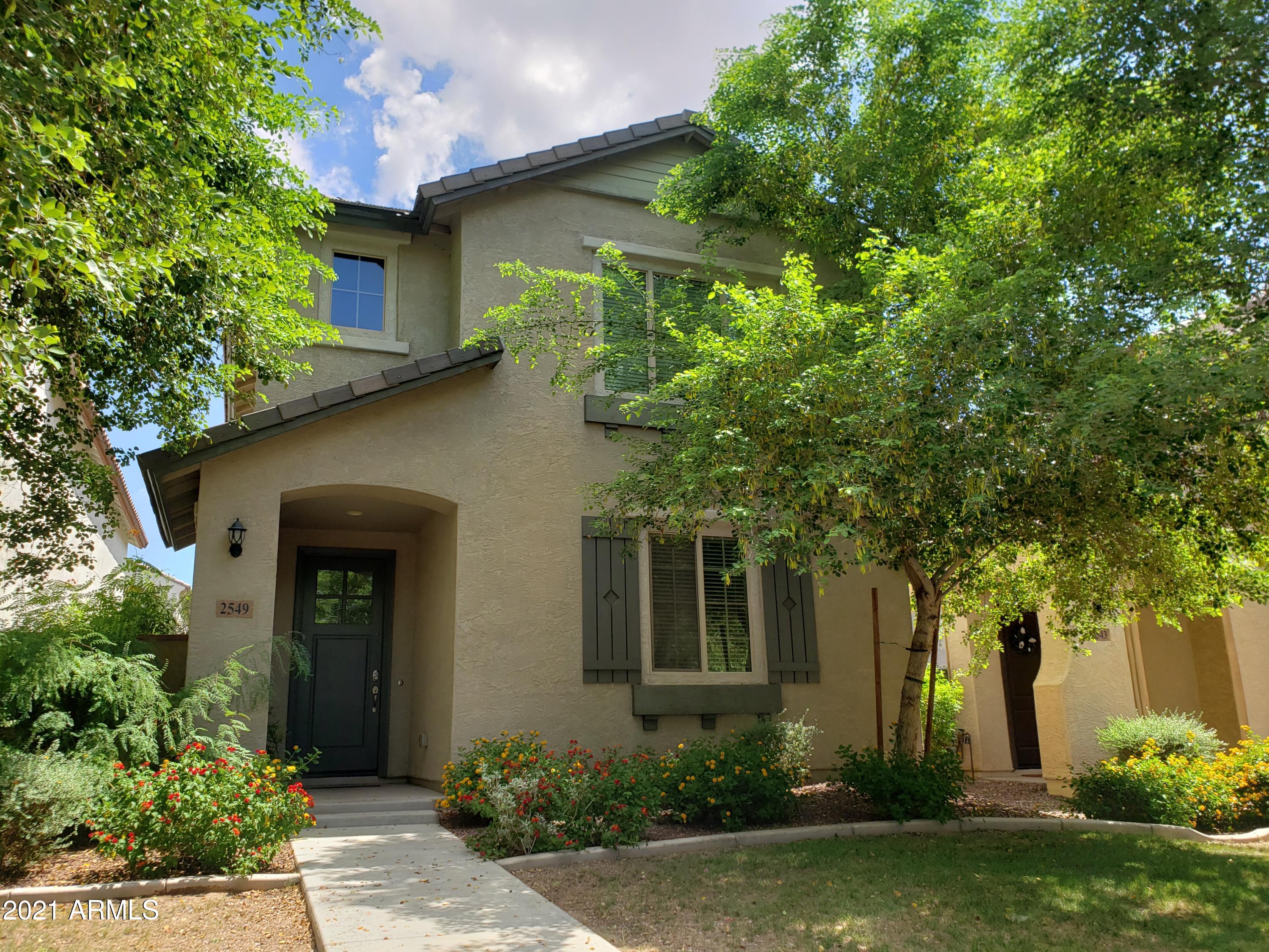 2549 North Riley Road Buckeye, AZ 85396 - Photo 3 of 46 front view of a house with a yard