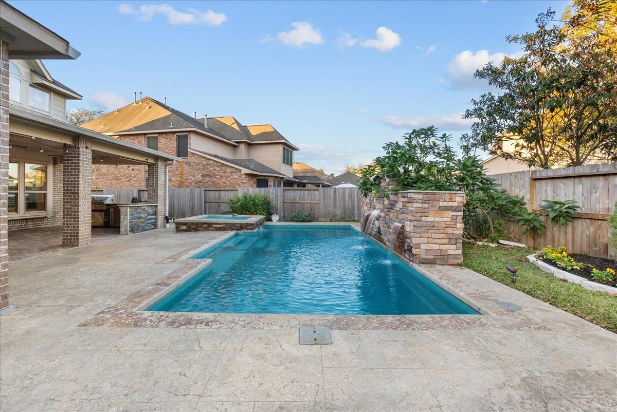 1358 Porta Rosa Lane League City, TX 77573 - Photo 41 of 48 Fire pit, pool, hot tub, covered patio and outdoor kitchen
