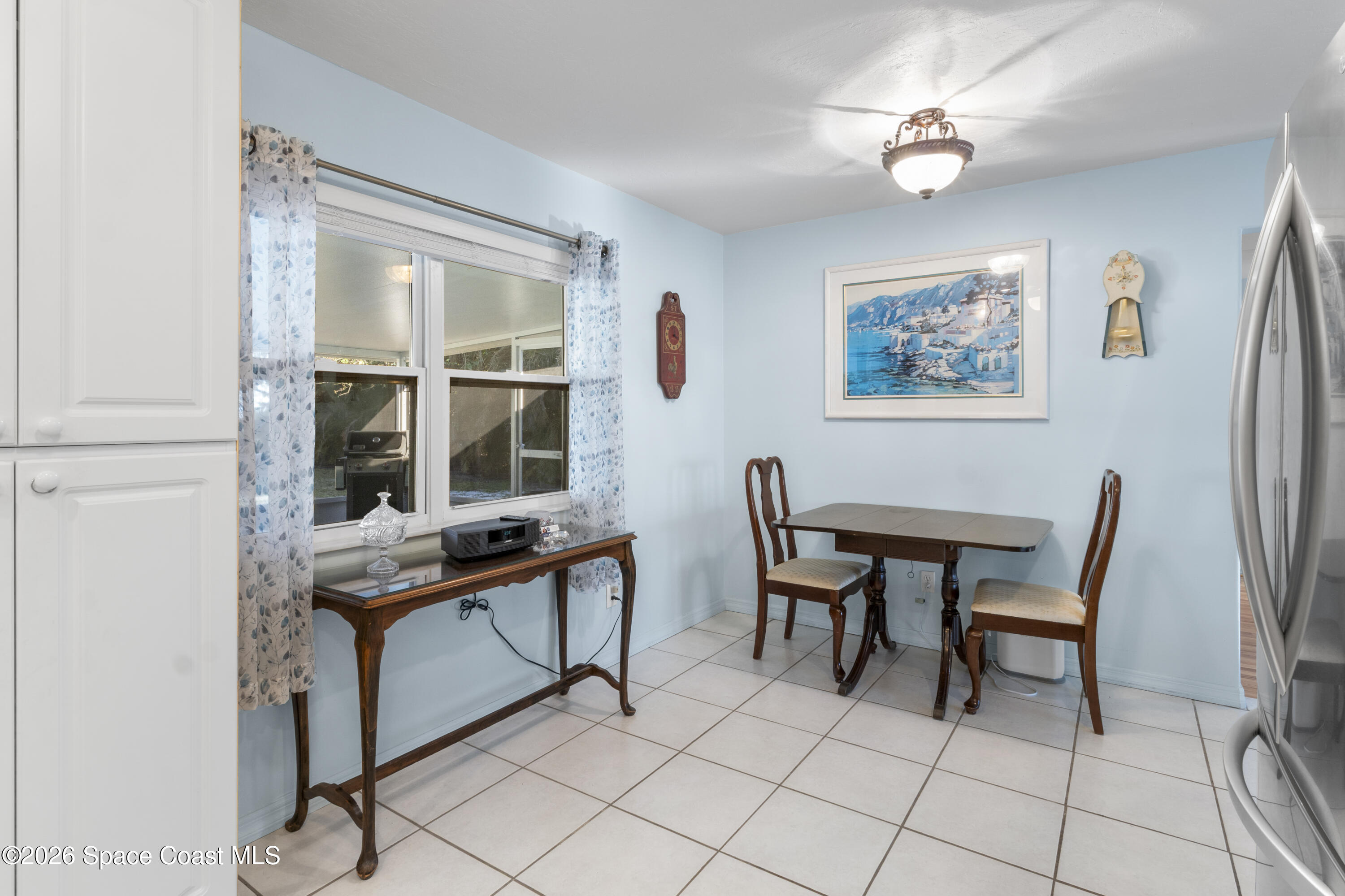 637 Roseland Road Sebastian, FL 32958 - Photo 13 of 36 a view of a workspace with furniture