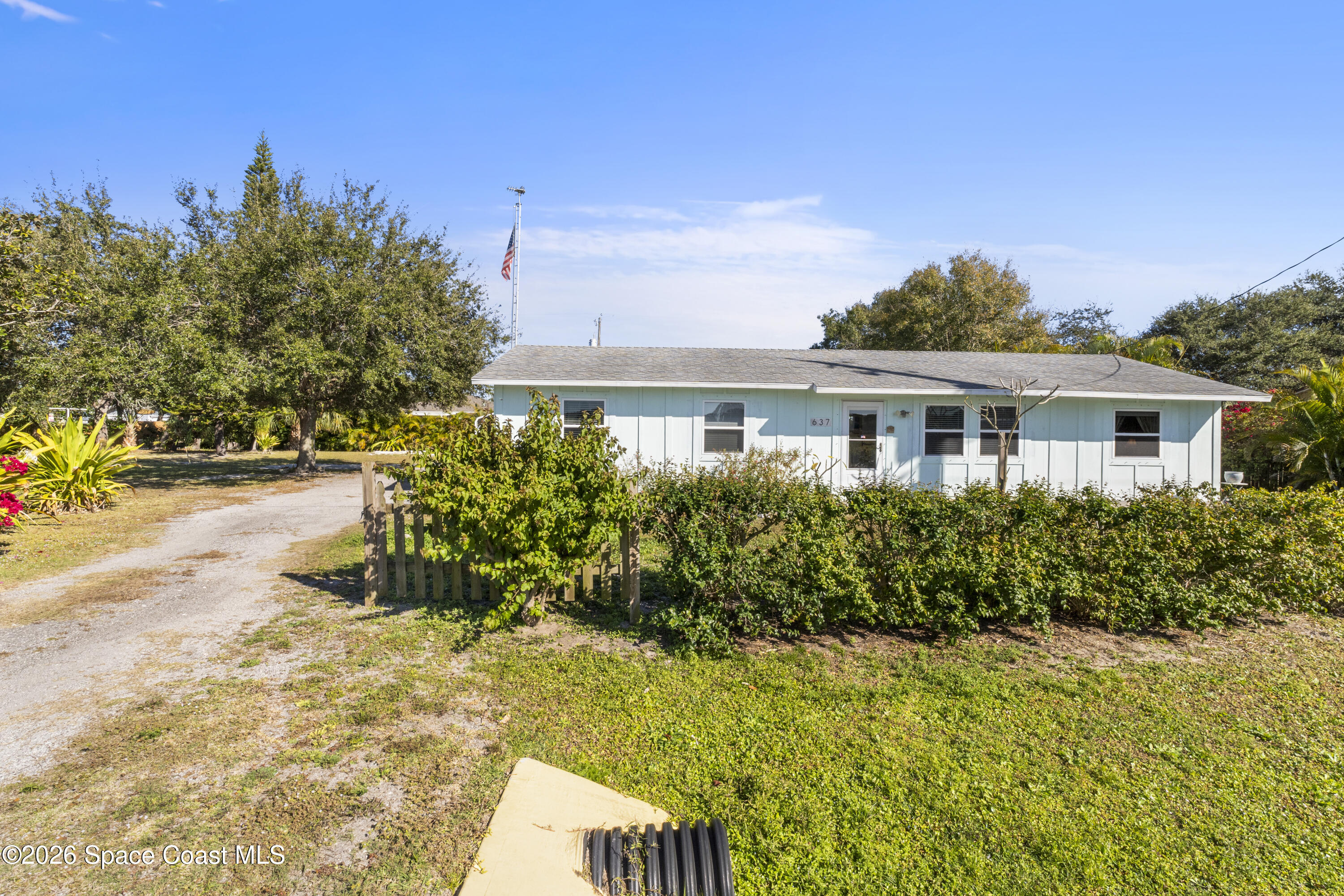 637 Roseland Road Sebastian, FL 32958 - Photo 2 of 36 a view of a house with a yard