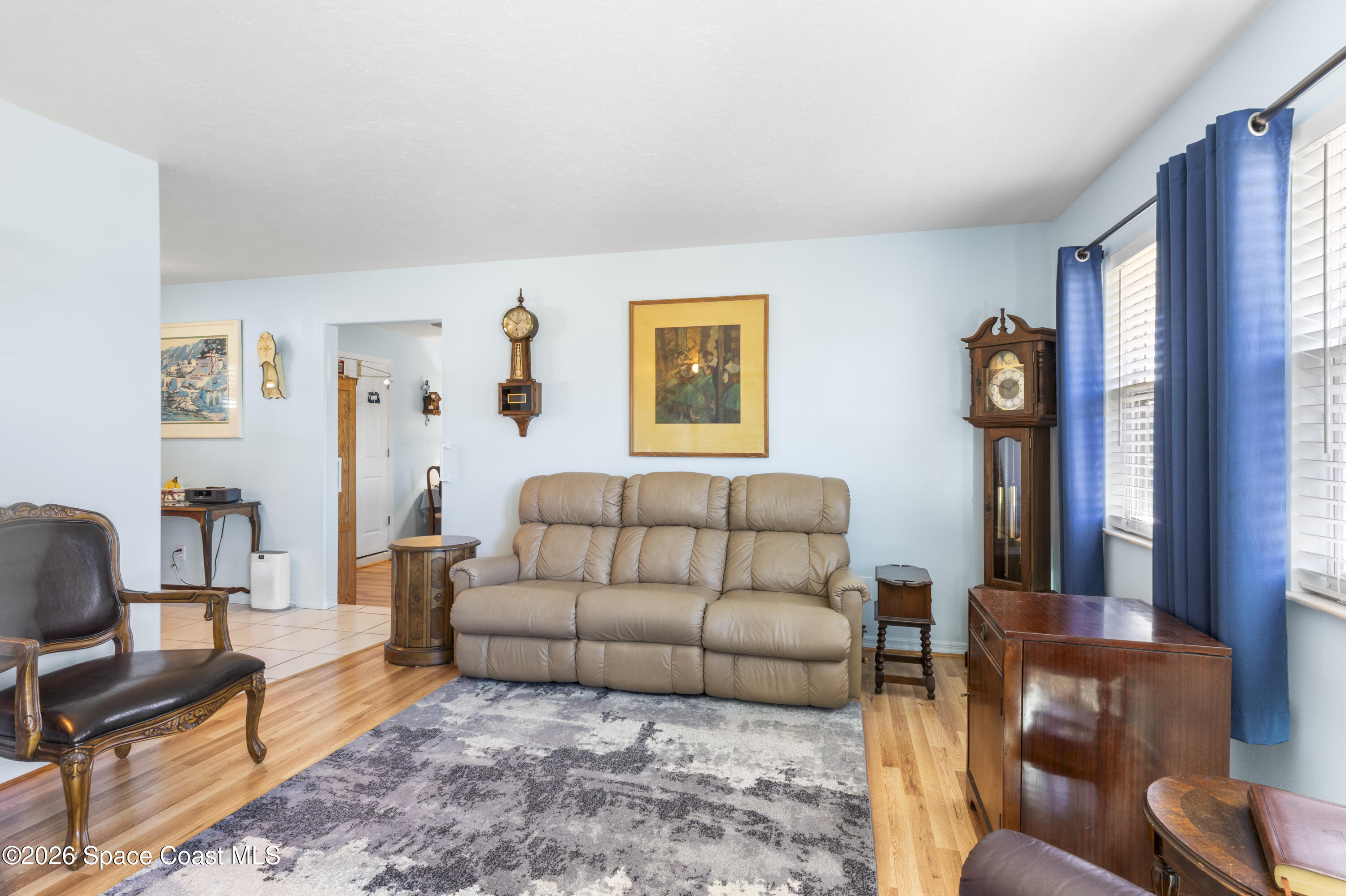 637 Roseland Road Sebastian, FL 32958 - Photo 7 of 36 a living room with furniture and a window