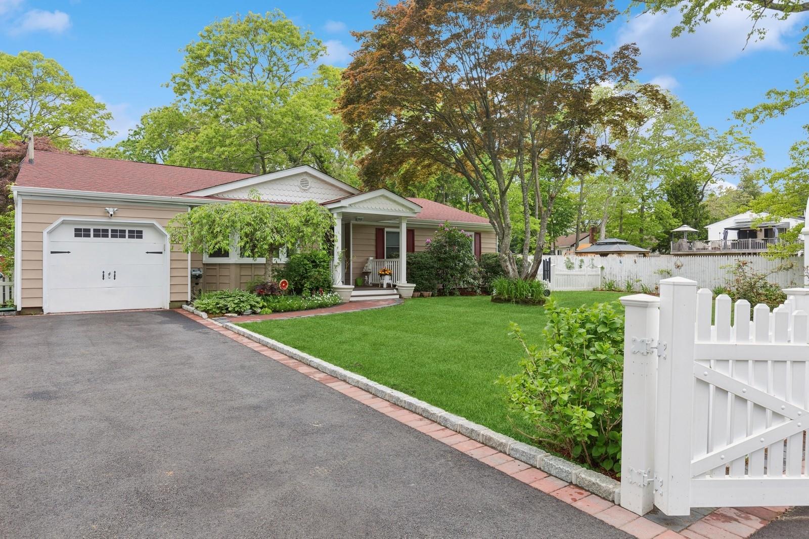 22 Ridge Road Shirley, NY 11967 - Photo 1 of 1 Ranch-style house with an attached garage, driveway, and a gate