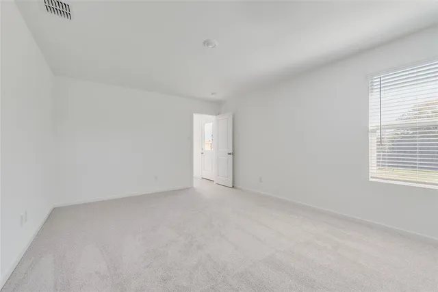 an empty room with a window