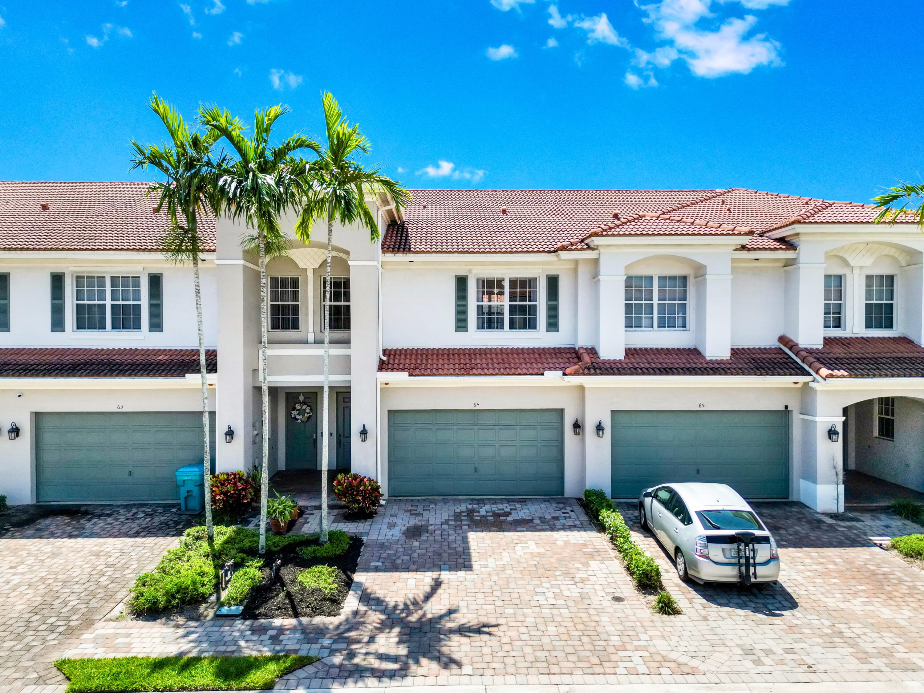 64 Lancaster Road Boynton Beach, FL 33426 - Photo 1 of 50 Front