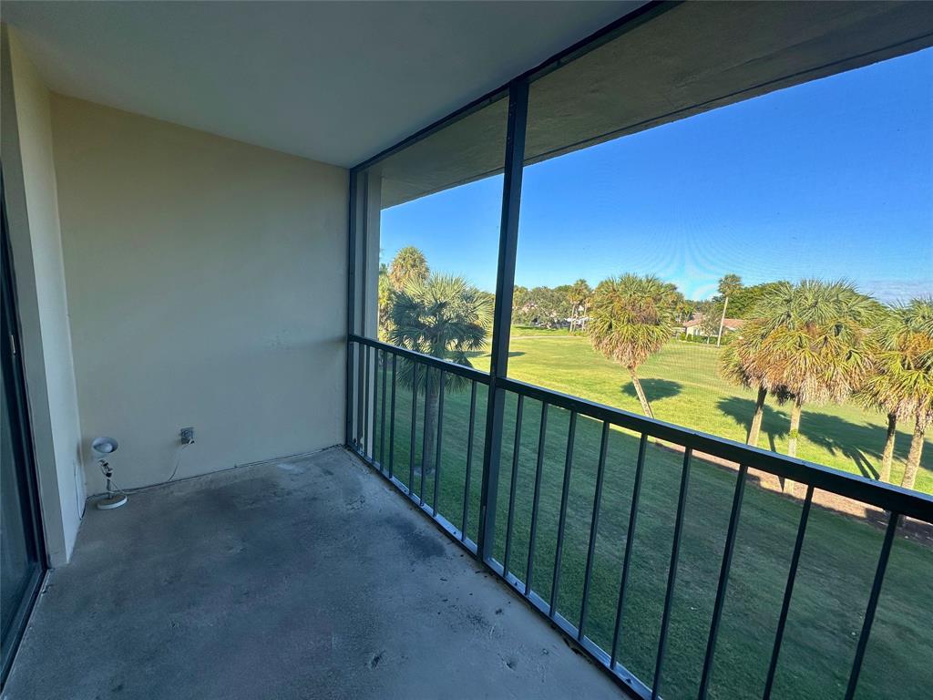 2420 DC Country Club Boulevard, Unit 306 Deerfield Beach, FL 33442 - Photo 16 of 23 a view of a balcony