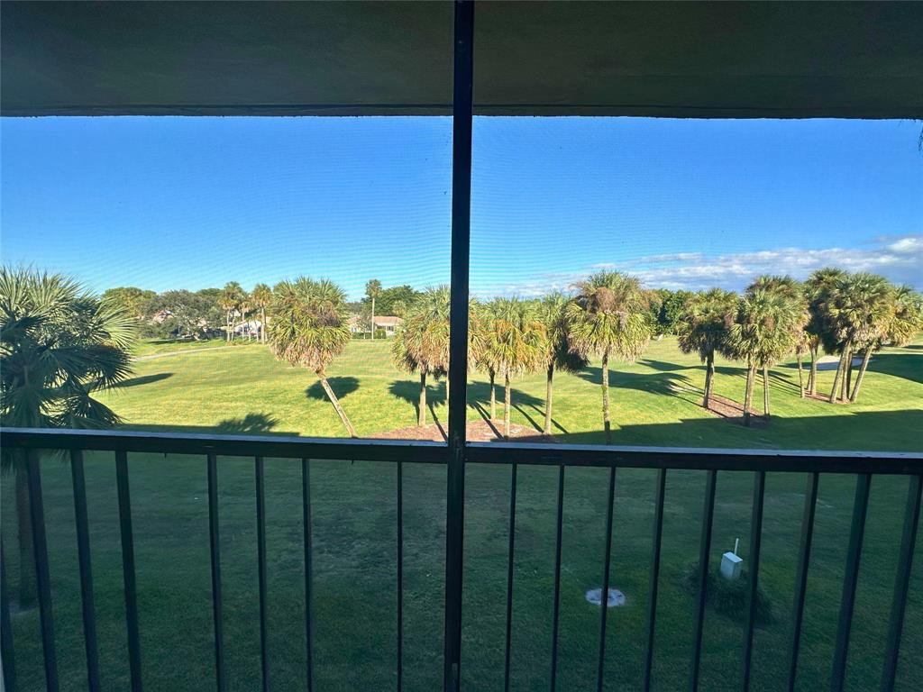 2420 DC Country Club Boulevard, Unit 306 Deerfield Beach, FL 33442 - Photo 19 of 23 a view of sky from a balcony