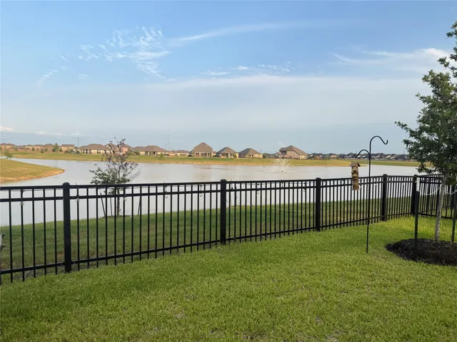 a view of a balcony with lake view and ocean view