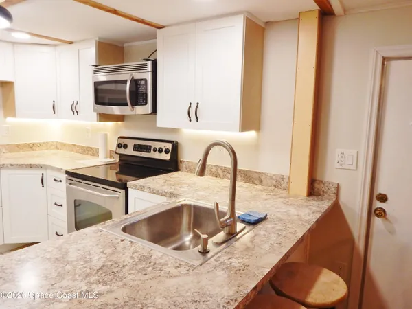 $134,000 | 1328 Turkey Creek Drive Northeast, Palm Bay, FL 32905