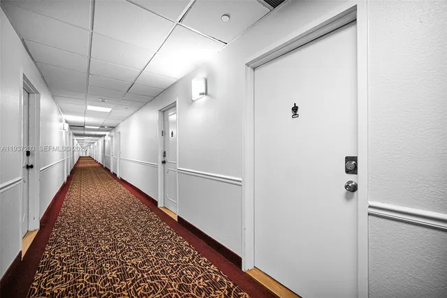 a view of hallway with a couch