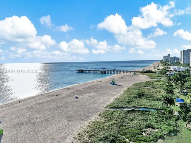 a view of a beach with a yard