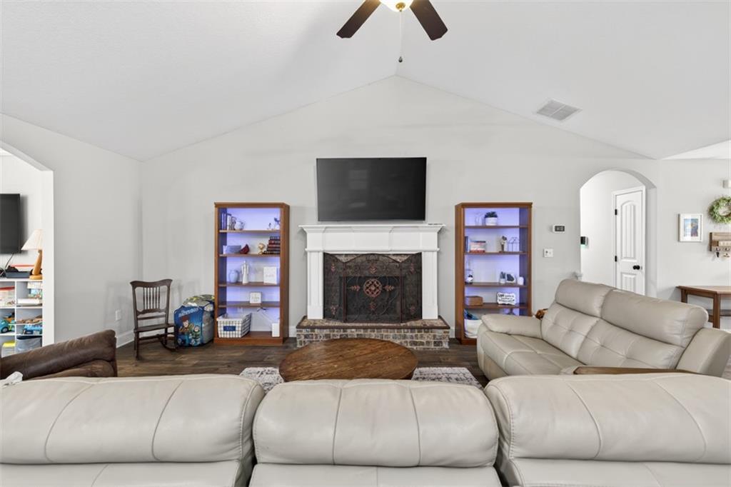 225 Tyler Way Jefferson, GA 30549 - Photo 11 of 43 a living room with furniture and a fireplace