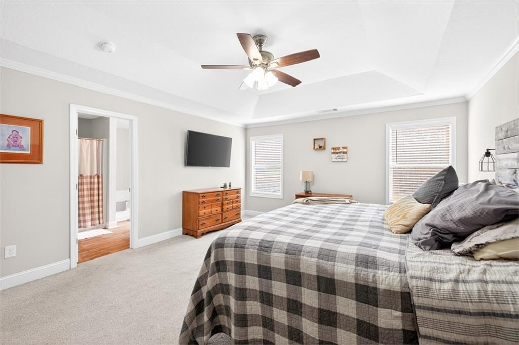 225 Tyler Way Jefferson, GA 30549 - Photo 32 of 43 a bedroom with a bed and window