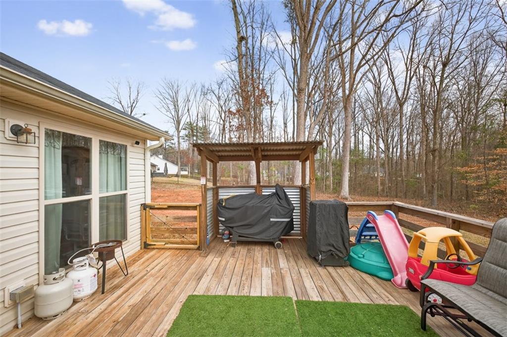 225 Tyler Way Jefferson, GA 30549 - Photo 39 of 43 a view of outdoor space yard deck and patio