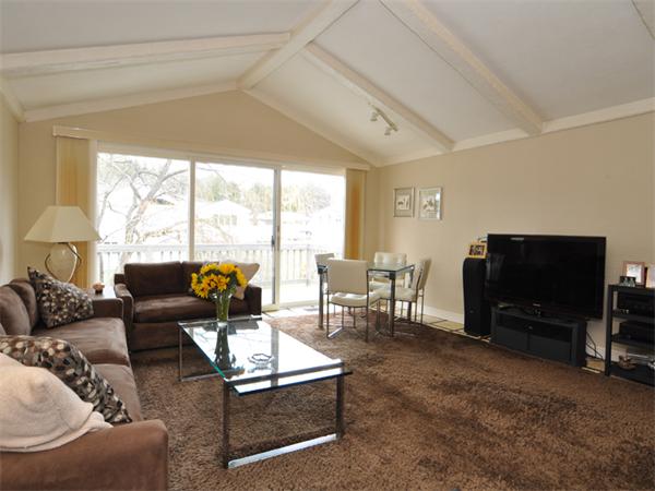 55 Gary Road Needham, MA 02494 - Photo 4 of 30 a living room with furniture and a flat screen tv