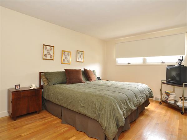 55 Gary Road Needham, MA 02494 - Photo 8 of 30 a bedroom with bed and window