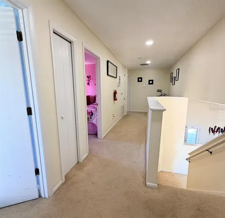 a view of hallway with washer and dryer