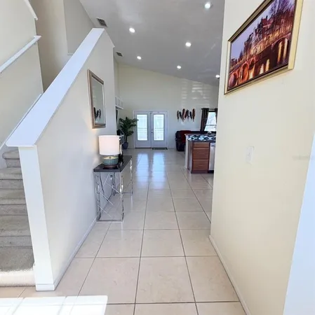 a living room with furniture and a rug