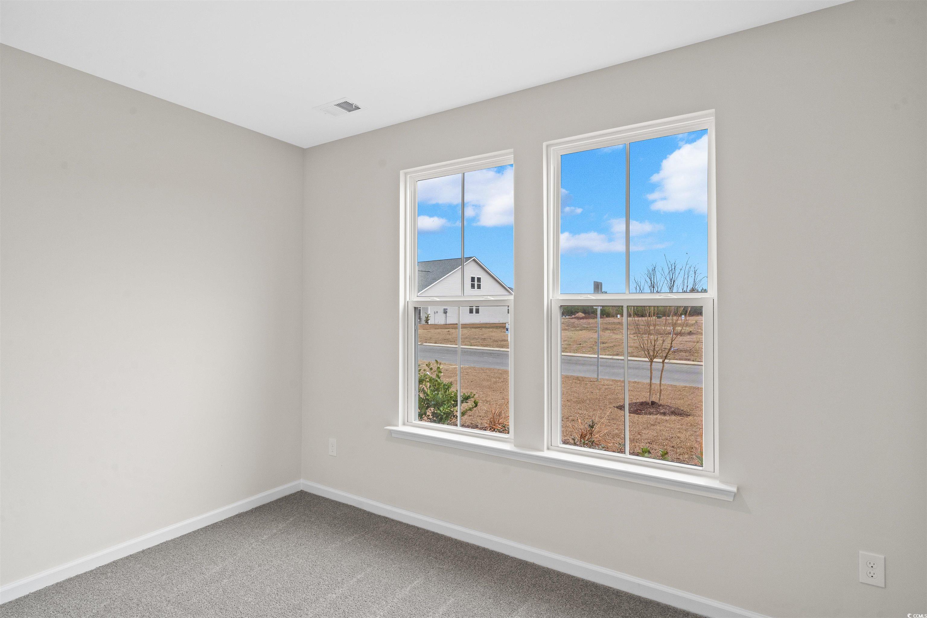 512 Sheepbridge Way Longs, SC 29568 - Photo 5 of 26 Doorway to outside with dark hardwood / wood-style floors