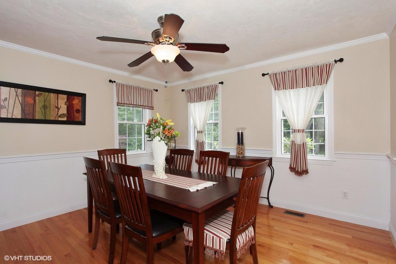 272 Cotuit Road Mashpee, MA 02649 - Photo 7 of 15 a view of a dining room with furniture window and wooden floor
