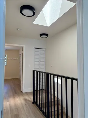 a very nice looking room with wooden floor