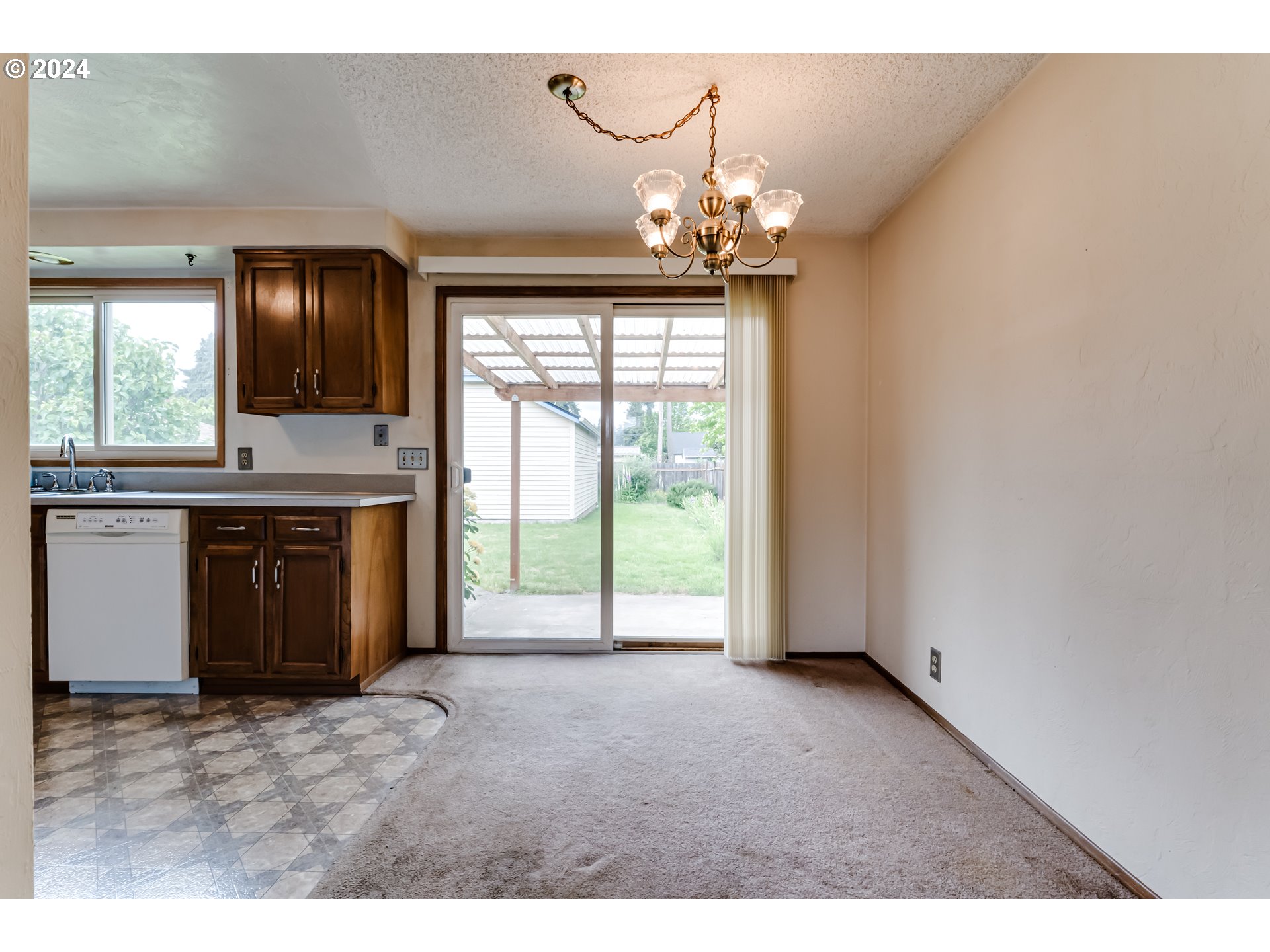 1038 5th Street Springfield, OR 97477 - Photo 11 of 26 a view of a kitchen with a sink and dishwasher kitchen view
