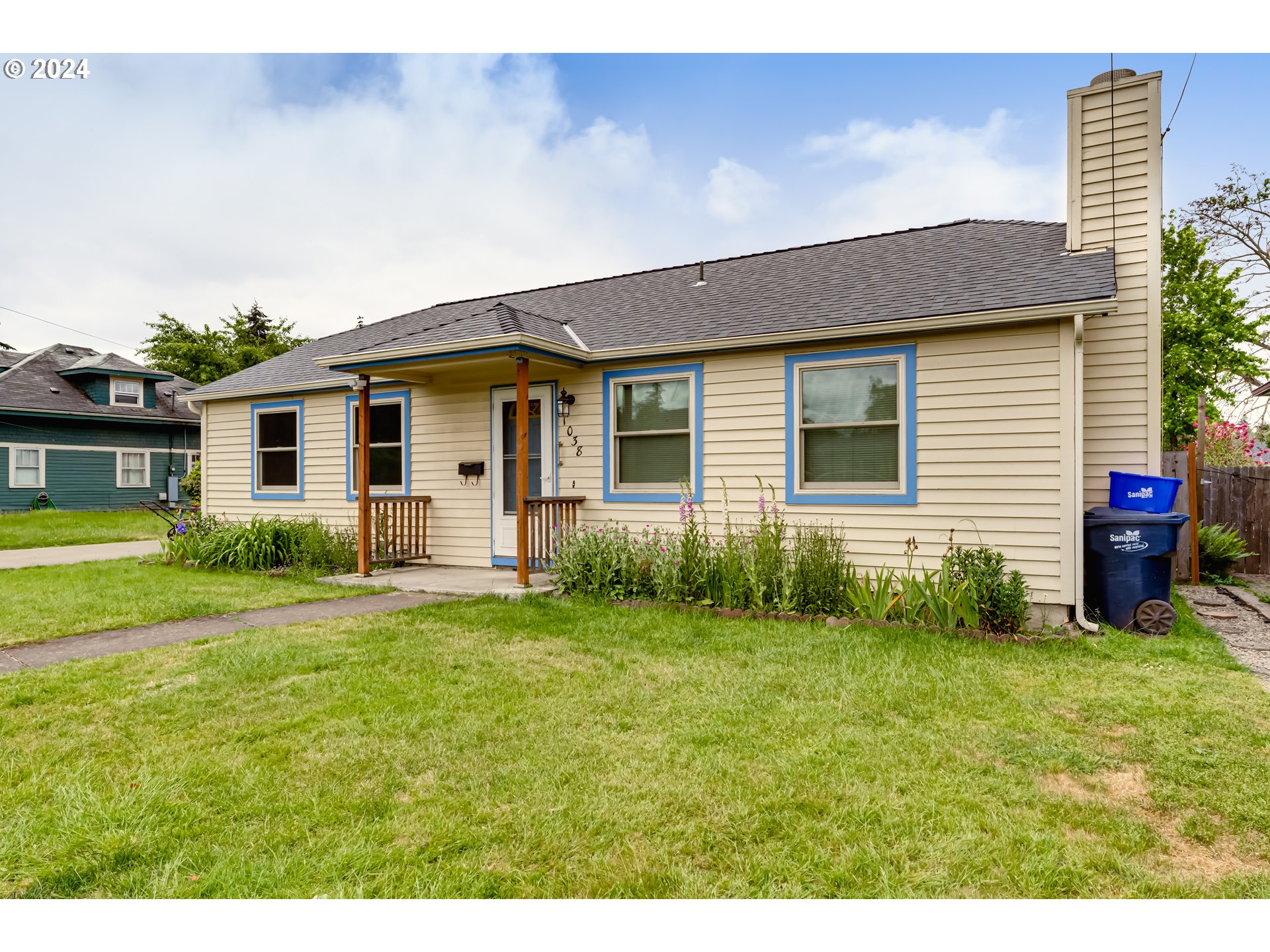 1038 5th Street Springfield, OR 97477 - Photo 2 of 26 a view of a house with a backyard