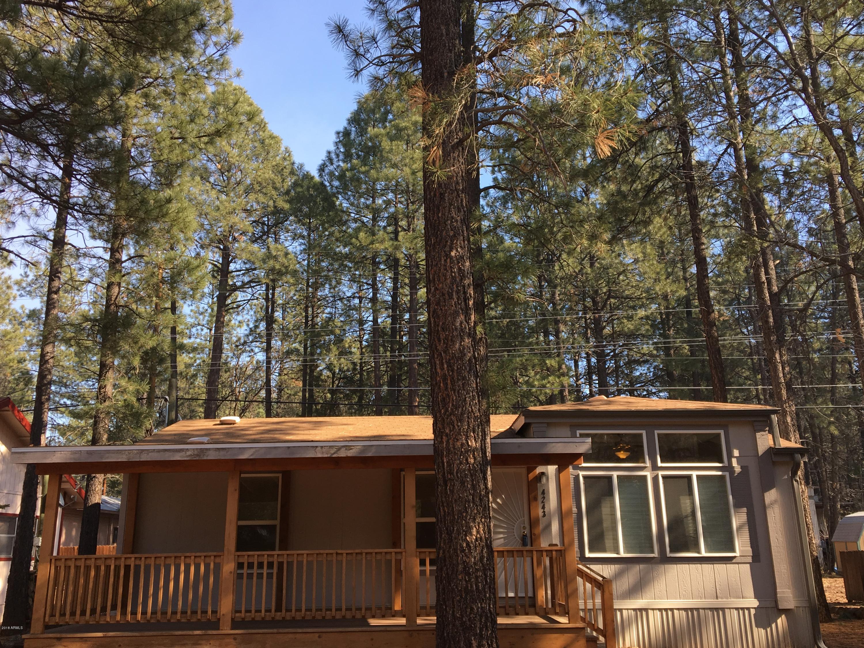 4243 East Blue Ridge Loop Pinetop, AZ 85935 - Photo 1 of 21 4243 Blue Ridge home in the woods