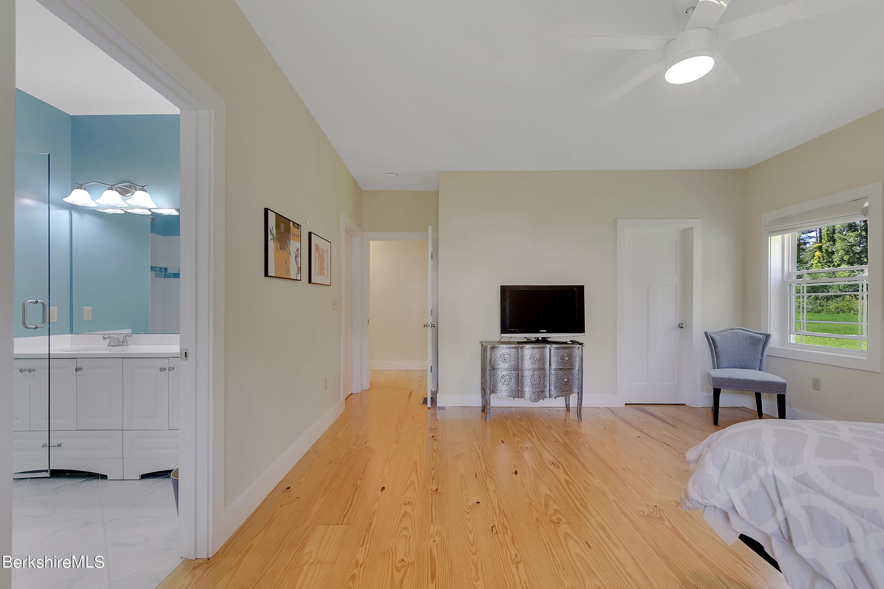 583 W Road Lee, MA 01238 - Photo 19 of 37 a living room with furniture and a flat screen tv