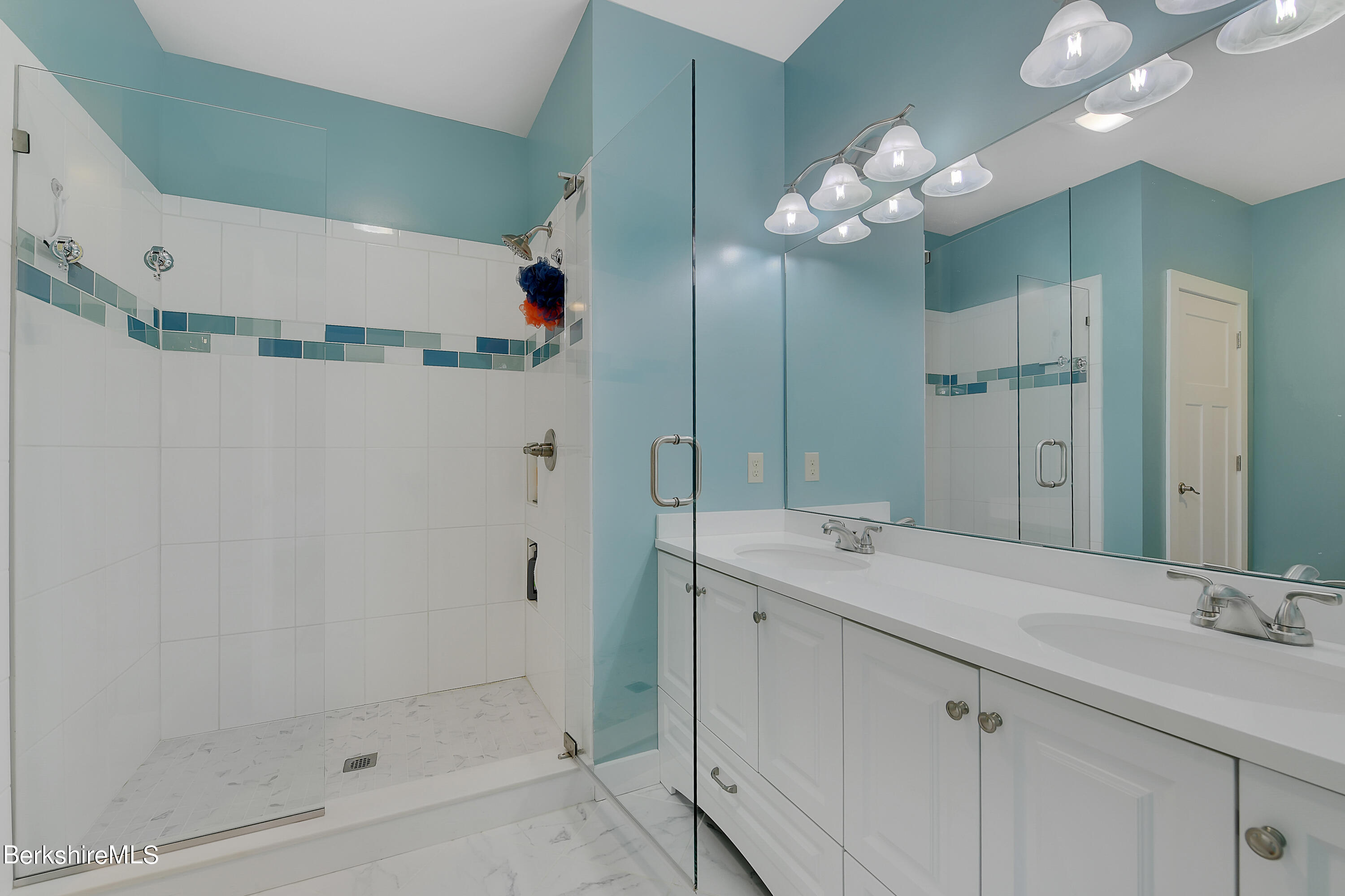 583 W Road Lee, MA 01238 - Photo 20 of 37 a bathroom with a sink and a mirror