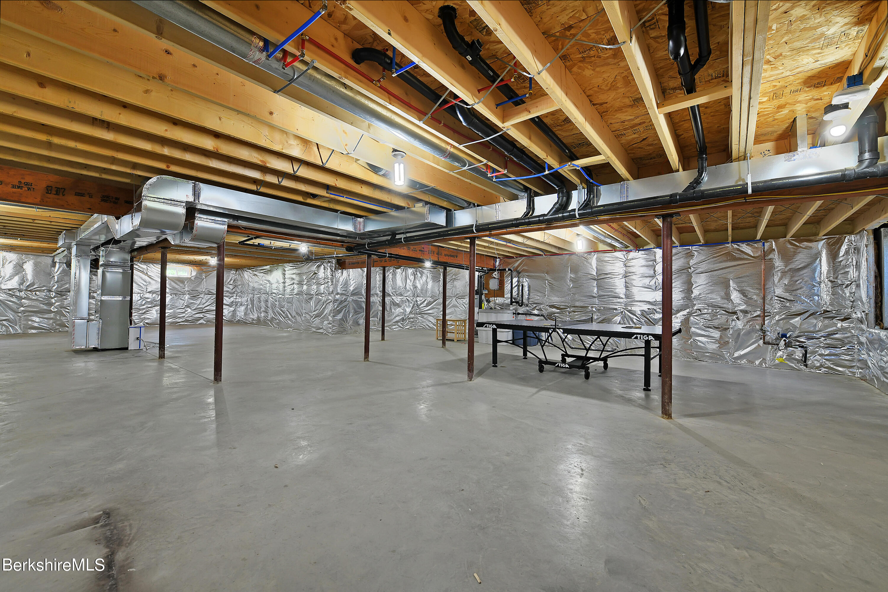 583 W Road Lee, MA 01238 - Photo 29 of 37 a view of an empty room with wooden floor