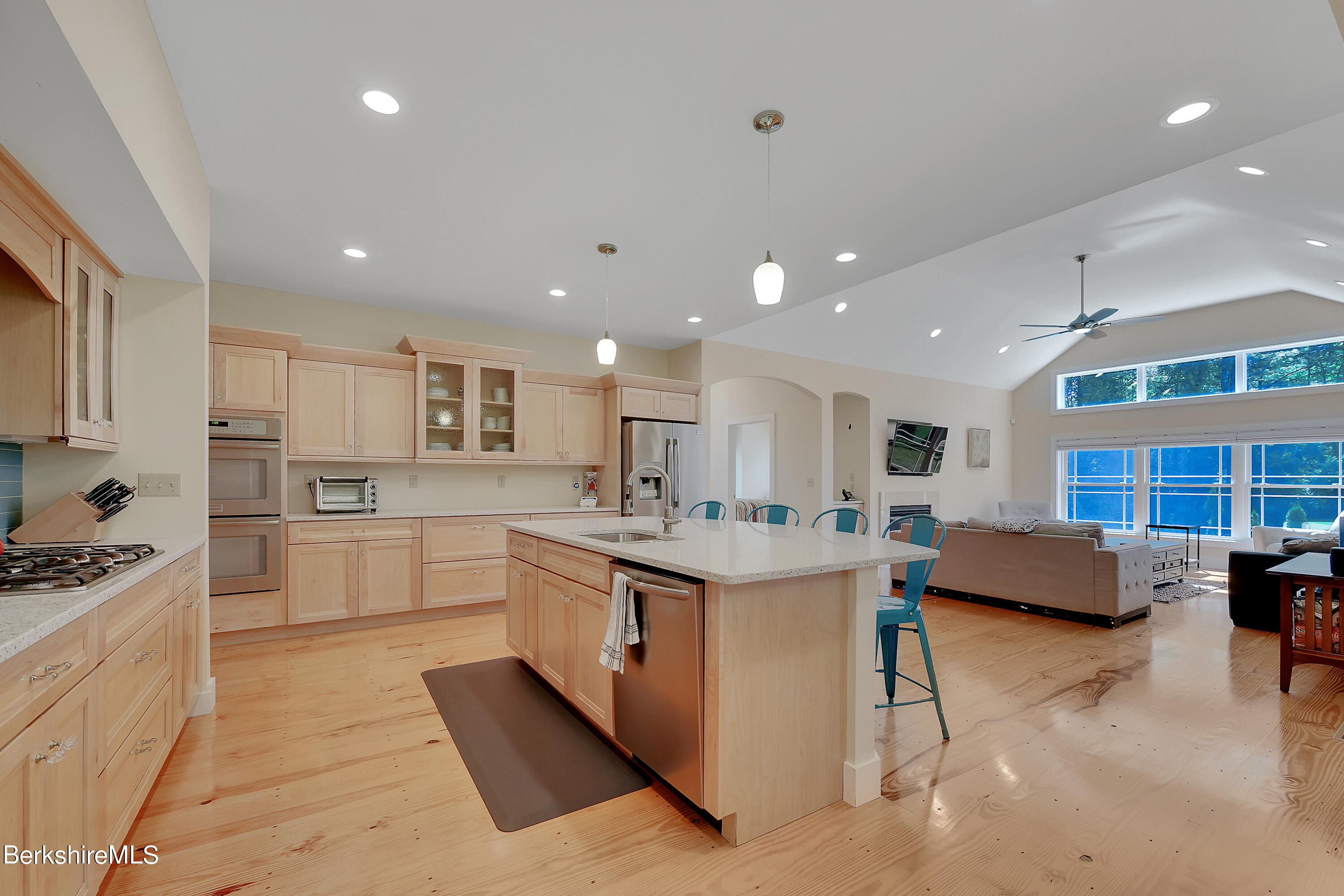 583 W Road Lee, MA 01238 - Photo 7 of 37 a kitchen with kitchen island granite countertop lots of counter top space and a sink