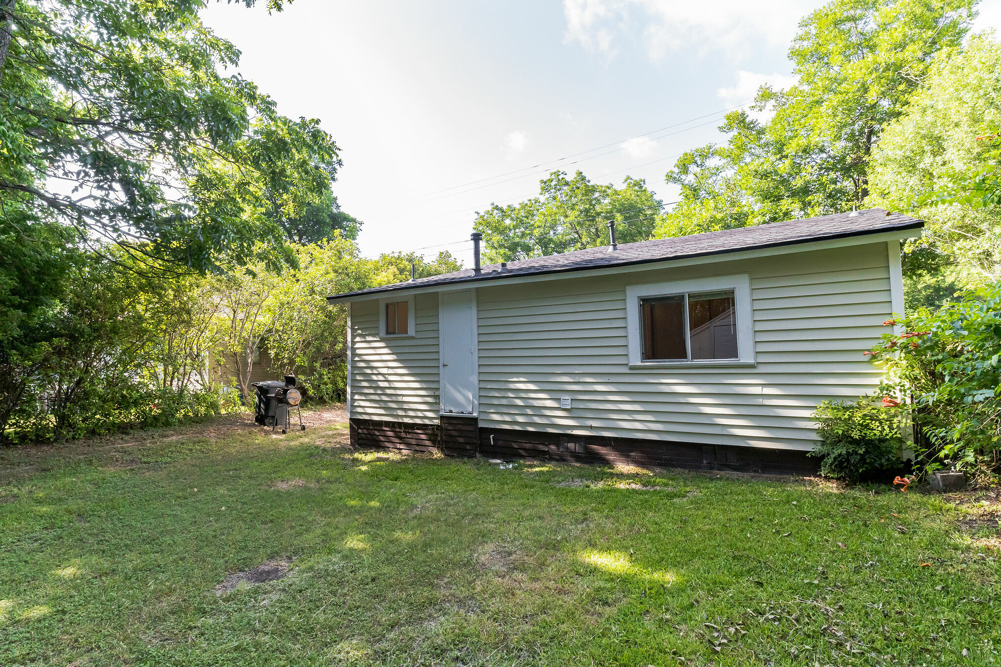 501 East 4th Street Georgetown, TX 78626 - Photo 25 of 25 a front view of a house with a garden