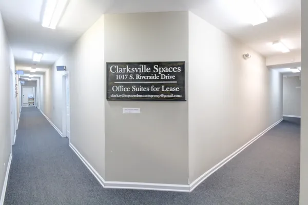a view of a hallway with elevator